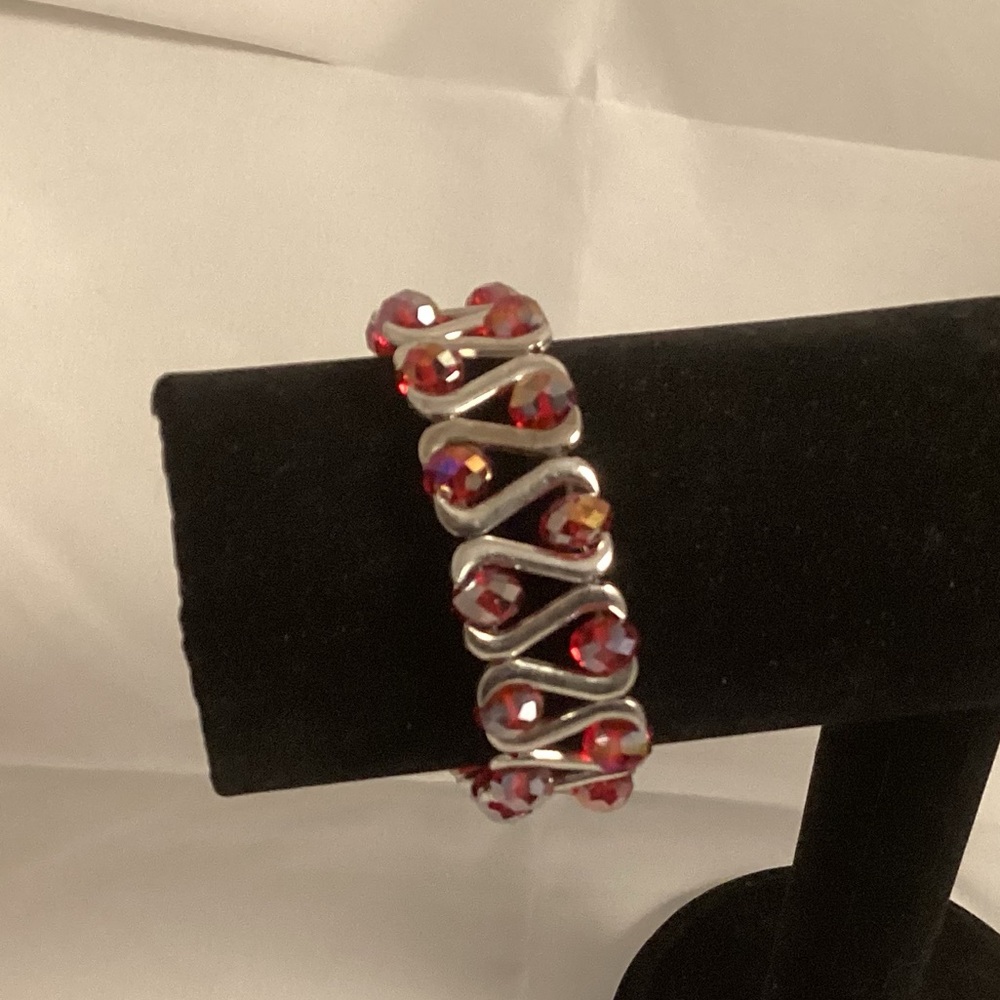 Red and silver tone beaded elastic bracelet